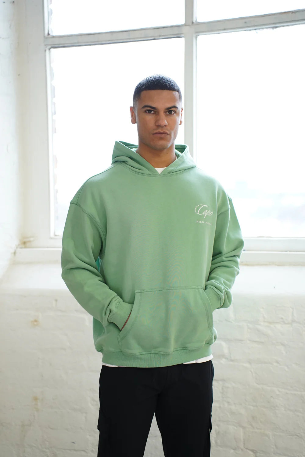 Capo International Hoodie - Washed Green